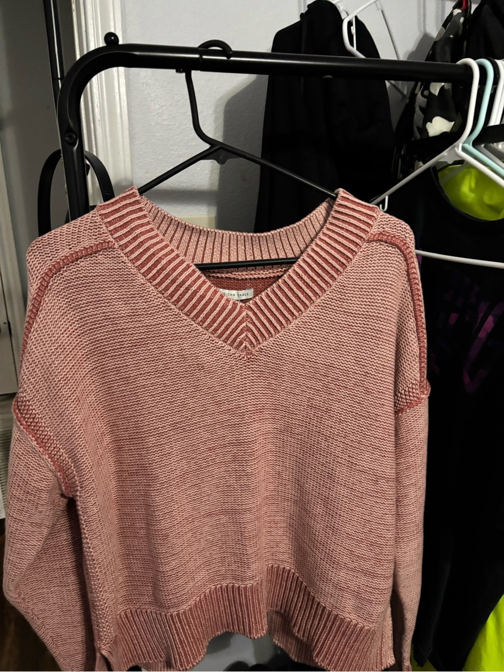 This is an American Eagle Long Weekend V-Neck Sweater featuring a chunky ribbed